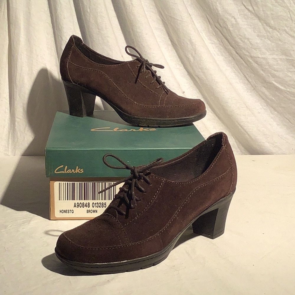 Clarks brown suede lace up heels.